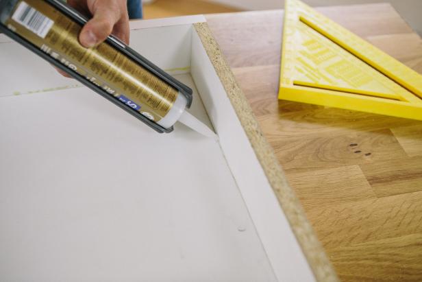 Apply silicone to edges of melamine form to seal cracks.