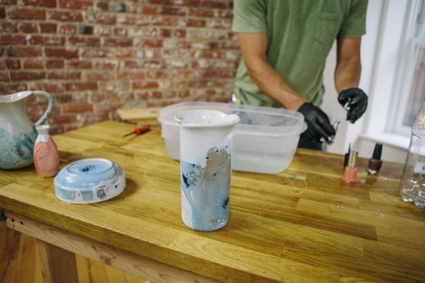 Let vases dry after dipping them in water.