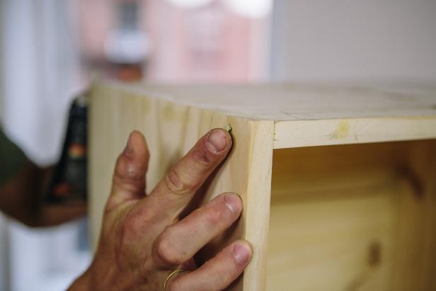 Apply wood filler to all nail holes.