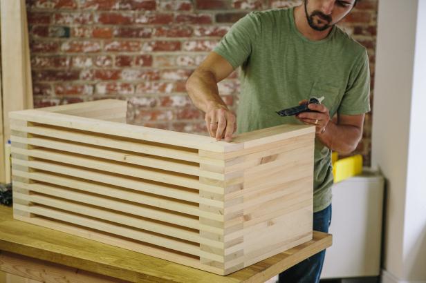 Apply wood filler to all nail holes on bench.