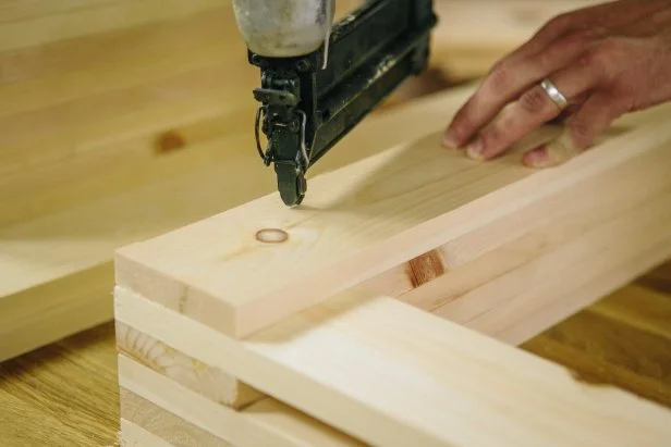 Attach more wood pieces with a nail gun to complete bench.