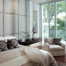 Contemporary Bedroom With Taupe Upholstered Accent Wall