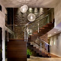 Contemporary Wood Staircase With Sleek Glass Railing