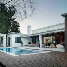 Contemporary Swimming Pool With Clean-Lined Pool Deck