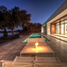 Modern Concrete Patio With Pool and Seating