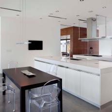White Modern Kitchen With Dining Table