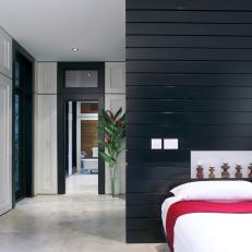 Black and White Contemporary Bedroom With Concrete Floor