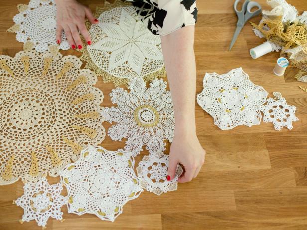 Once you have completed several doilies, group them together into an eye-pleasing ârunâ. Start by placing the larger doilies in the center, then fan out to include the smaller ones .Once you have the layout you like, pin together to hold them into position.