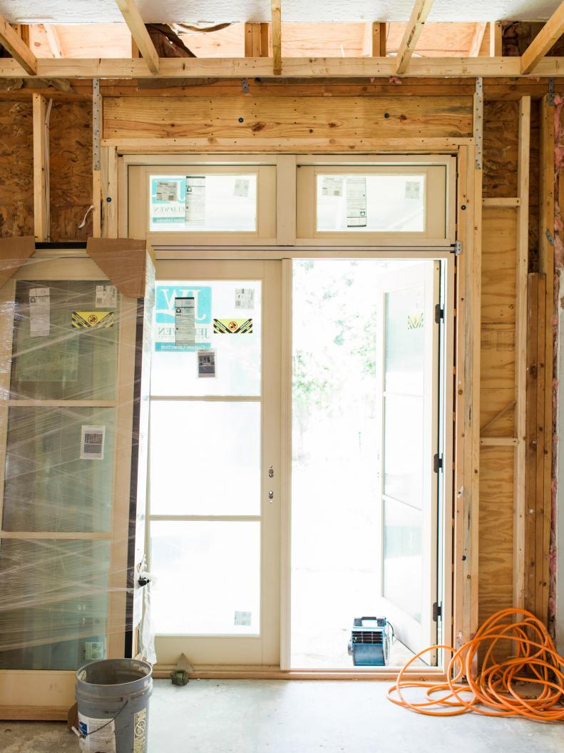 If you're short on space inside of the room, an outward swinging door is ideal; however, inward swinging doors are ideal for any small patios or porches connected to interior spaces with generous square footage.