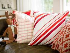 Add another layer of cheer to your holiday decor with this retro peppermint-stripe throw pillow. The best part? No needle and thread required.