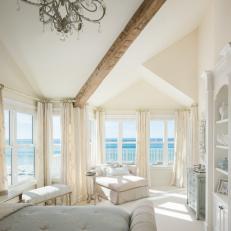 White Master Bedroom with Ocean View and All-white Linens, Curtains and Furniture