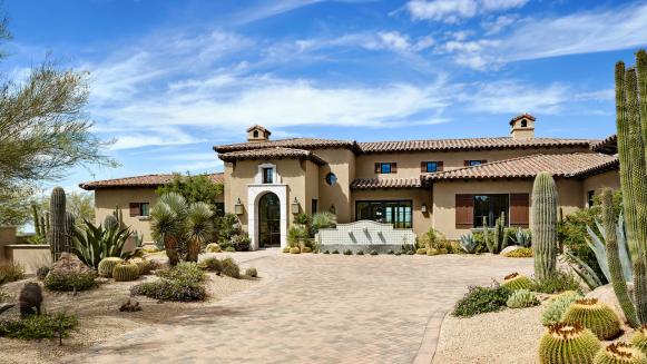 Southwestern Home Exterior With Desert Landscaping