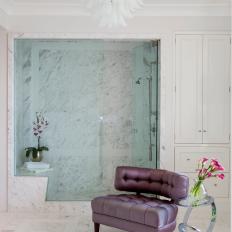 Bathroom with Marble Shower, Marble Floors and Modern Accents