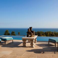 Outdoor Lounge Area featuring Infinity Pool Overlooking the Ocean