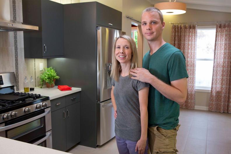Posing in their transformed kitchen complete with all new LG appliances, Elisabeth and Roger Scheck are well pleased with the results of HGTV's House Hunters Renovation.