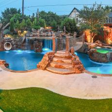Backyard Retreat With Tropical Grotto-Themed Pool