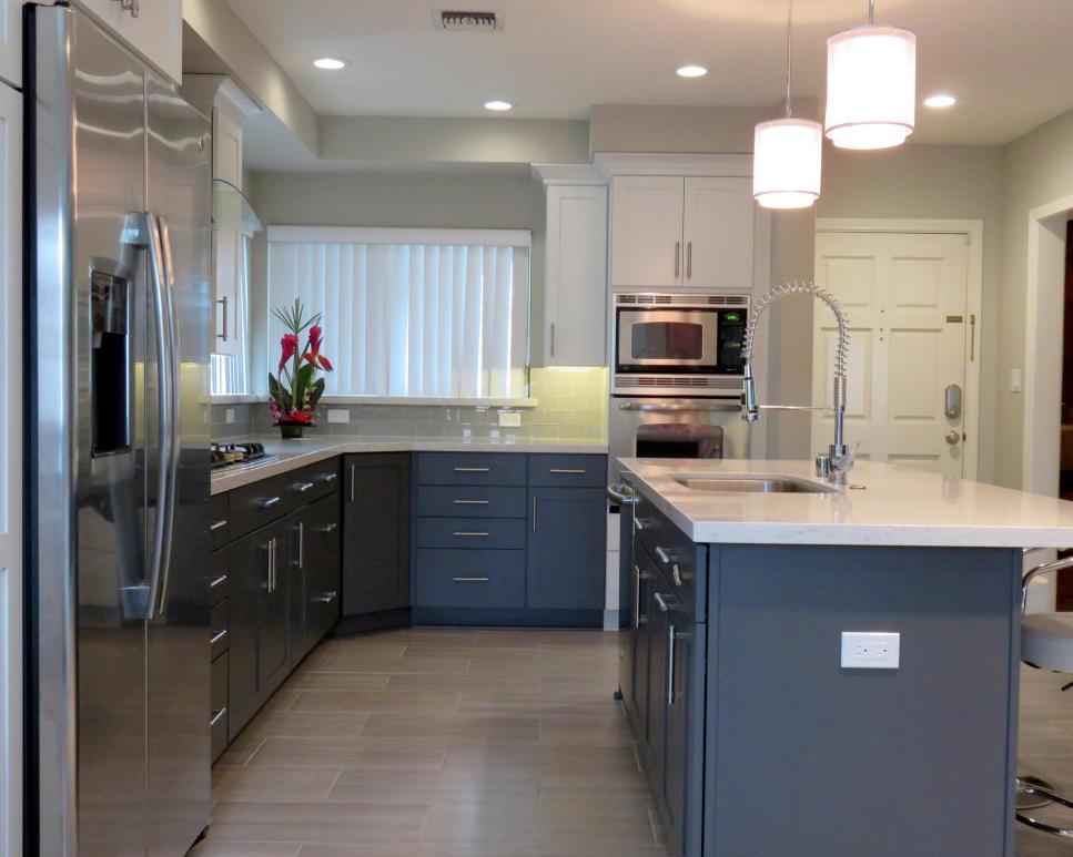 Modern Neutral, White and Black Kitchen with Kitchen Island and Light Hardwood Floors | HGTV