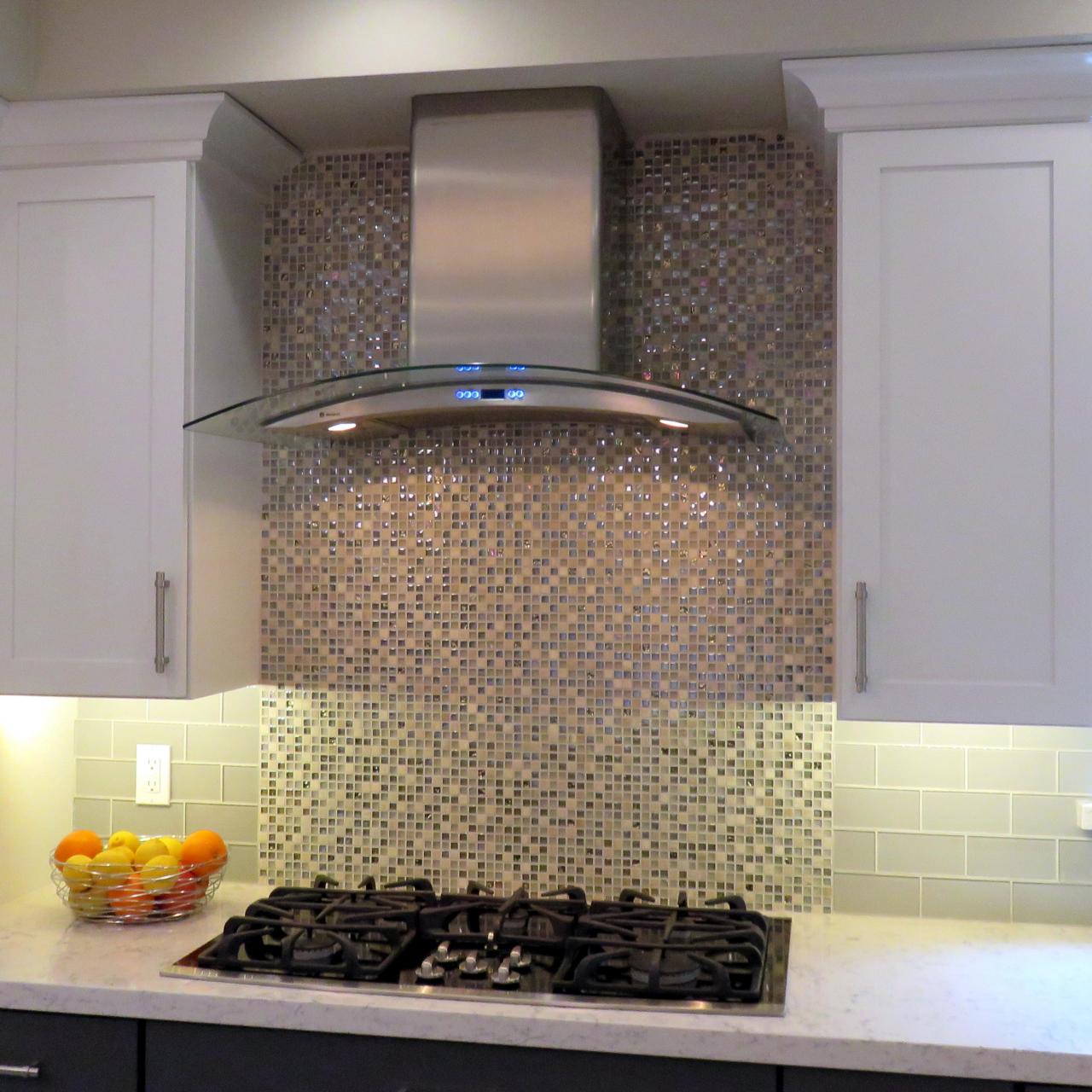 Glass Tile Backsplash in a Modern Kitchen featuring Tones of Browns and Grays HGTV