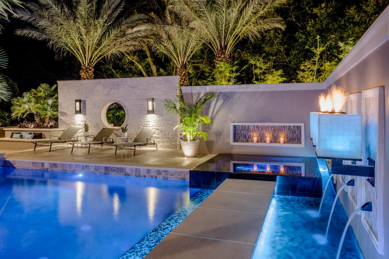 Tropical Pool With Sunken Fire Pit Seating Area | HGTV, image size:1280x854