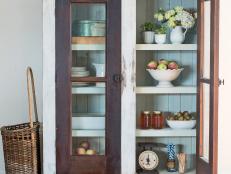 Many beautiful antique doors and windows are orphaned from their original cabinetry, furniture or homes. There are thousands of ways to repurpose them decoratively, but this project shows how to make them functional again as doors to a cabinet.