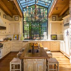 French Country-Inspired Kitchen With Grand Skylight 