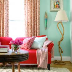 Transitional Sitting Area With Colorful Furnishings and Accents