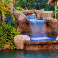 A Backyard Tropical Pool Waterfall