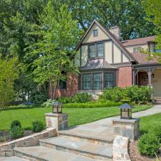 Tudor Craftsman Home with Stone Curved Entry Stairs