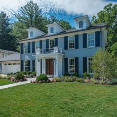 Federal Style Two Story Home Landscaped with Boxwood Hedge