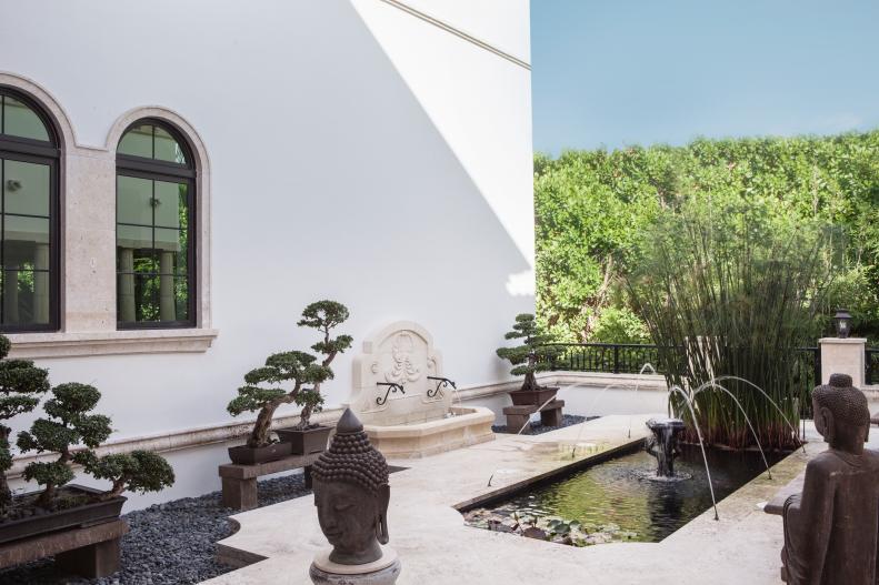 Zen Garden with Water Fountain and Bonsai Trees