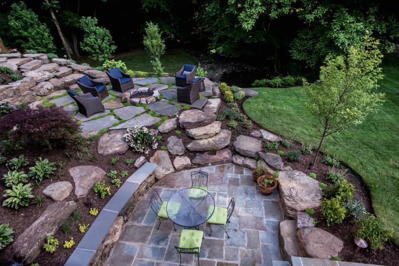 Stone Terrace With Firepit and Patio Set