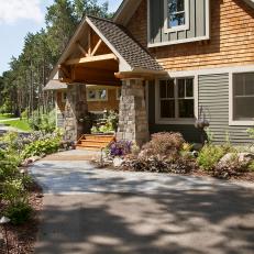 Front Entry Landscaping With Paver Walkway, Wood Steps and Gardens