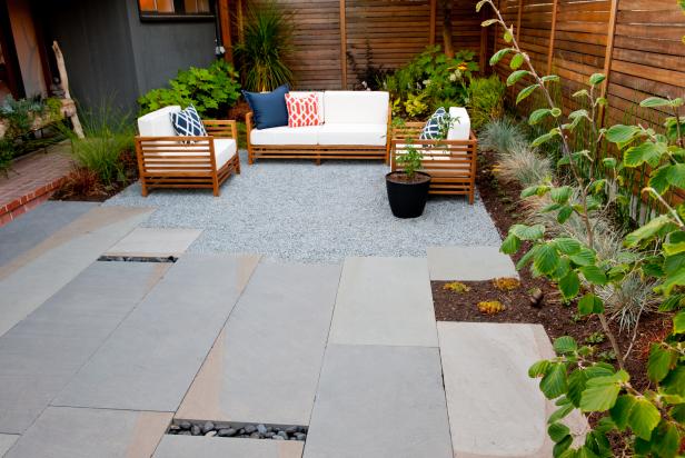 Modern Courtyard with Stone Pavers, Seating and Cedar Fencing