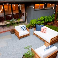 Modern Seattle Courtyard with Stone Pavers, Lighting and Seating