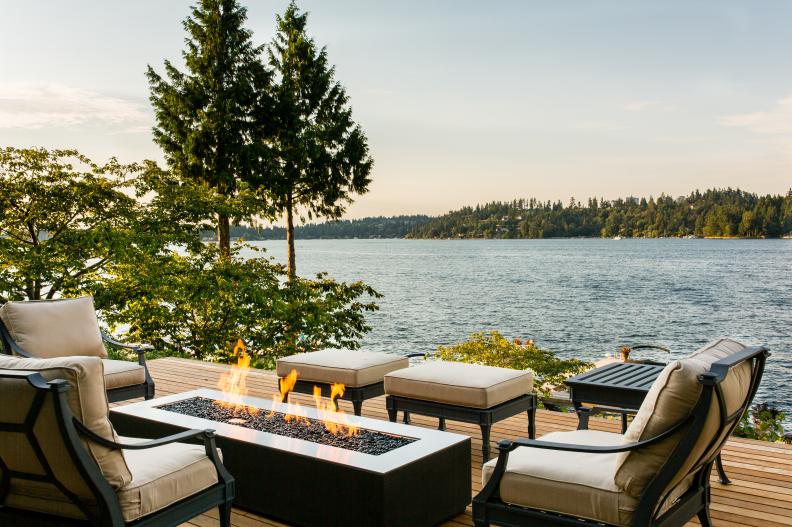 Lakeside Deck With Lounge Chairs and Firepit