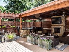 Screened Outdoor Living Space with Seating and Fireplace