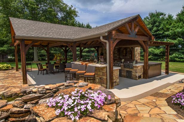 Covered outdoor shop kitchen with fireplace