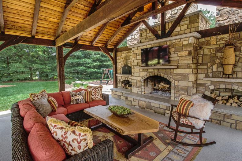 Outdoor Pavilion with Stone Fireplace and Seating Area