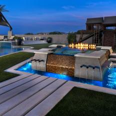 Modern Water Feature and Pool in Luxury Backyard