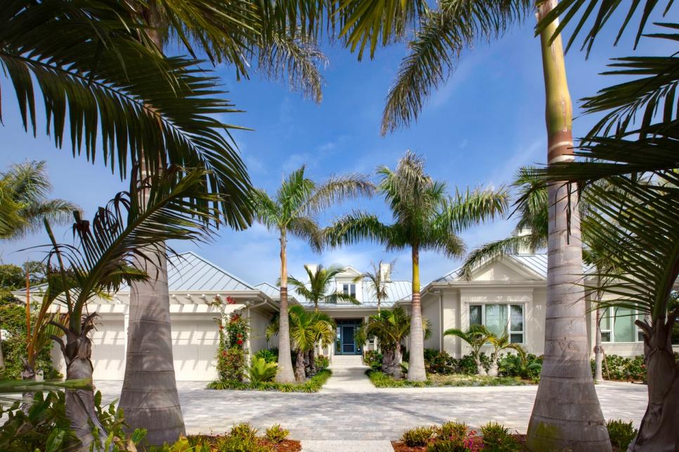 Tropical Entryway with Palm Trees and Driveway