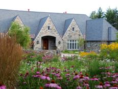 Old World-style Design with Stone Exterior and Perennials