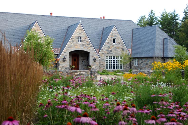 Old World-style Design with Stone Exterior and Perennials