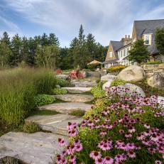 Pastoral Backyard with Stone Stairs and Walls