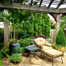 Outdoor Living Space is Surrounded by Lush Plantings