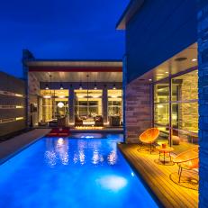 Modern Swimming Pool Features in Home's Landscape