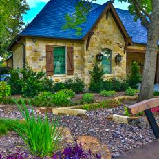Evergreen Shrubs and Ornamental Grasses Add Charm to Stone Guest House