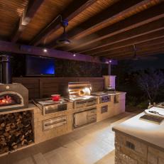 Nighttime Entertaining at its Finest in the Gourmet Outdoor Kitchen. 