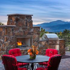 Southwestern-Inspired Patio With Stacked Stone Fireplace