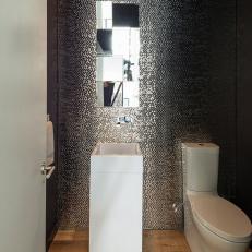 Metallic Modern Powder Room With Mosaic Wall