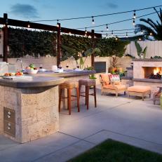 Backyard With BBQ Island and Outdoor Fireplace